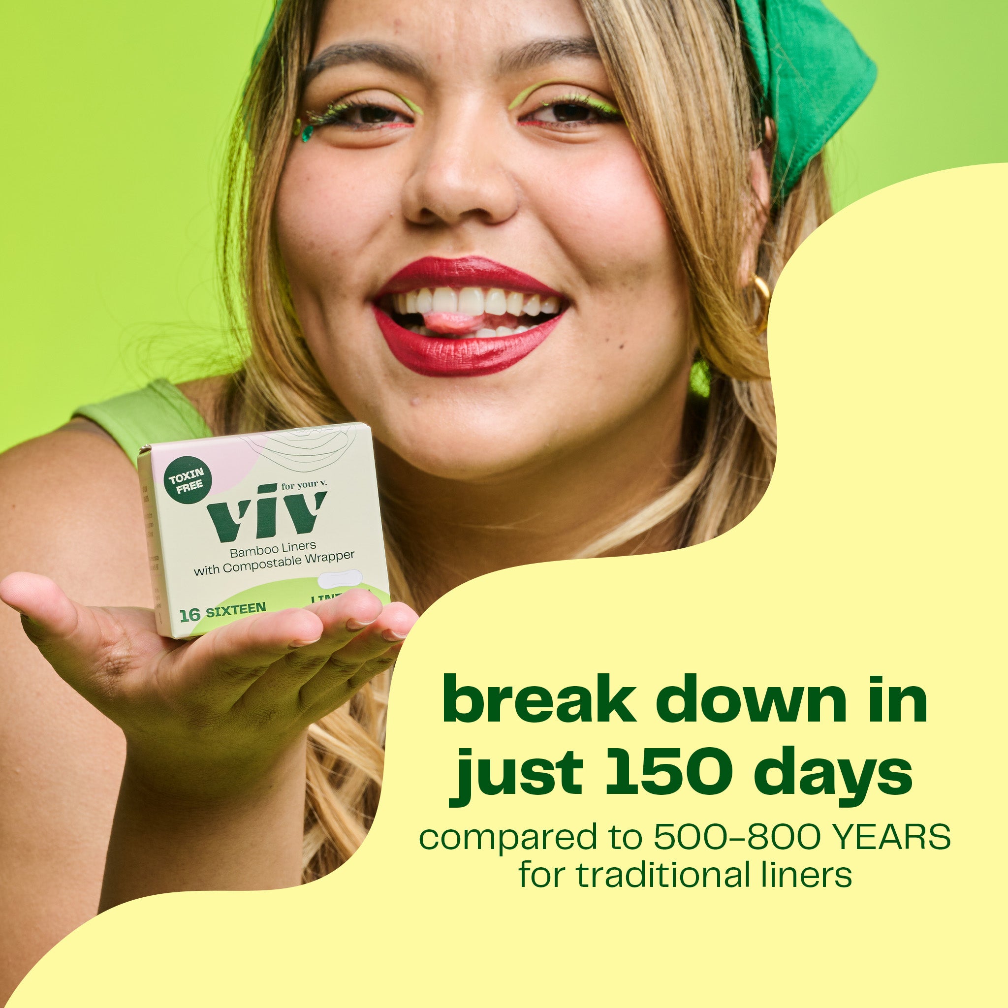 A girl holds a box of Viv Toxin-Free Bamboo Liners with compostable wrappers while smiling and sticking her tongue out. Viv Panty Liners break down in just 150 days, compared to 500-800 YEARS for traditional liners, making them a safe, natural, eco-friendly & sustainable period care option.