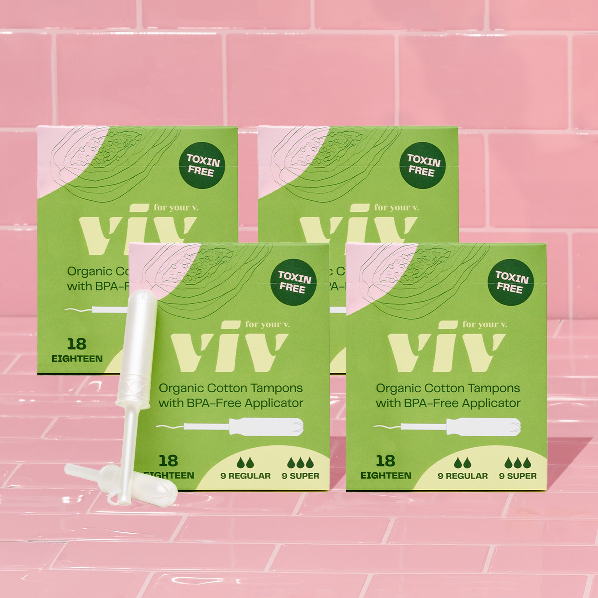 Four boxes of Viv Organic Cotton Tampons with BPA-Free Applicators sit on a pink tile background. Save when you bundle and stock up on tampons with Viv's safe, sustainable period care options.